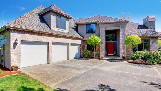 Weigh the advantages and drawbacks of a concrete driveway for your home.